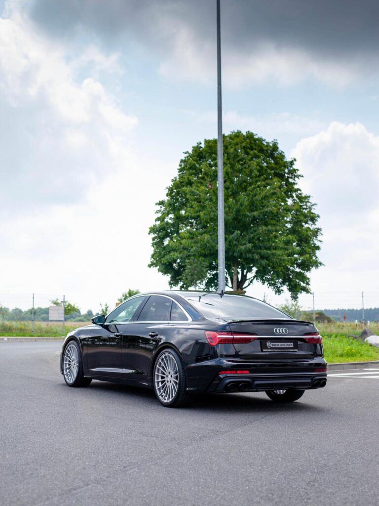 Audi A6 35 TFSI 4K in Schwarz im S6 Look mit HAMANN Anniversary Felgen in Silver